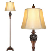 Sucolite vintage floor lamp with ornate scroll enhances rustic living room ambiance.