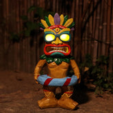 SudsYard Tiki swim ring statue glowing at night for poolside ambience.