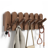Sueuapp walnut wall coat rack shows natural grain for warm, organized entryways.