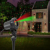 SUNFUCAN laser christmas projector outdoor lights project a festive garden scene.
