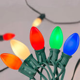 SUNSGNE C7 LED multicolor outdoor lights illuminating a patio for festive evenings