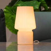 SUREYOND Mushroom Lamp with white glass shade on a table for warm ambience.