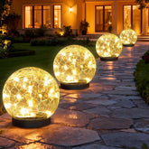 SyouHome solar globe crackle-ball close-up illuminating pathways with a warm glow