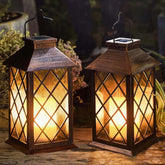 TAKE ME 14-inch solar lantern hanging in the garden for ambient outdoor lighting.