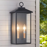 Tarentlight 18-inch wall light with clear glass adds modern curb appeal.