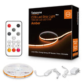 Tatazone 16-4ft 1800K COB LED strip emits a warm amber glow for living spaces