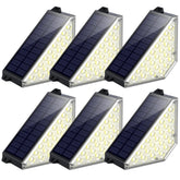 TECKNET solar step light installed horizontally for safe night navigation on stairs.