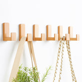 Teenyyou six-pack kids wall hooks in wood color for tidy bedrooms