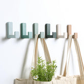 Teenyyou wooden kids wall hooks in green keep coats organized and bright.