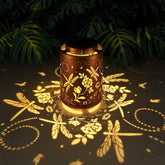 Tepaken dragonfly lantern hanging glows warm solar light for cozy outdoor evenings.