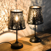 Timeflies dimmable tree lamp shadow creates calming forest silhouettes for living rooms.