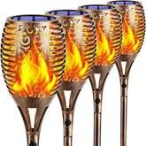 TomCare solar lights dancing flame front view in bronze enhances outdoor ambiance.
