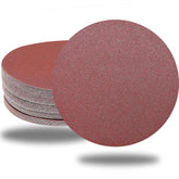 Tonmp 7in sanding disc with hook-and-loop back for easy swapping on drywall sander.