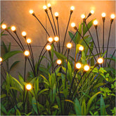 TONULAX solar garden light swaying gently in breeze for magical evening ambiance