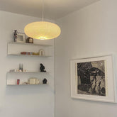 TopAAA white oval paper lanterns ready to hang for ambient lighting.