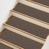 TranquilMoments stair treads with non-slip backing for secure footing on wooden stairs.