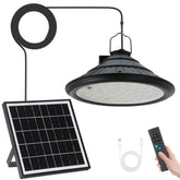 TREVIONE solar chicken coop light pendant illuminating a coop at dusk, off-grid-friendly.