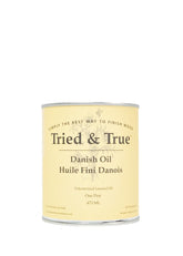 Tried & True Danish Oil bottle pour demonstrates rapid penetration for wood.