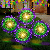 Tujoe Mardi Gras solar firework lights illuminate outdoor paths with vibrant green, purple, and yellow hues.