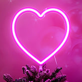 Tujoe pink heart neon tree topper adds warm glow for Valentine’s Day decorations