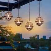 TWINKVILLA outdoor solar hanging lanterns illuminate patios with beaded copper wire accents.