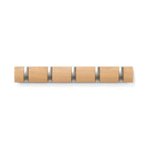 Umbra Flip 5 wall mounted hook coat rack with retractable hooks for space-saving coat storage.