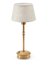 UMEXUS cordless lamp with fabric shade and antique brass finish for cozy bedside ambiance