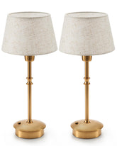 UMEXUS small cordless lamp emits a warm ambient glow on a living room side table