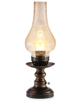 UMEXUS Vintage table lamp with amber glass shade delivers warm ambient light for cozy bedrooms.