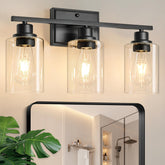 Unicozin 3-light vanity fixtures in matte black with clear glass for modern style.