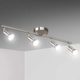 Unicozin LED track lighting kit with four heads for focused room illumination.