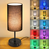 Unicozin table lamp with black shade provides soft, diffused light for reading