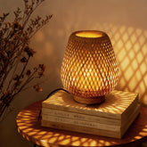 URLIGHTS table lamp with dual-layer bamboo shade illuminating a cozy living room.