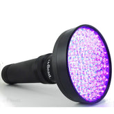 uvBeast black light flashlight front view shows compact design and bright UV beam.