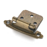 Vallecloud antique brass hinges close-up showing sturdy steel finish.