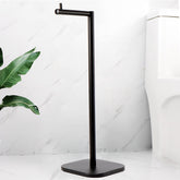 Vanloory toilet paper holder stand with weighted base for stable use on wet bathroom floors.