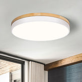 VIOLOEMI modern wood round ceiling light with oak finish provides warm ambient lighting.