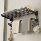 Voldra matte black 24-inch towel rack with foldable shelf for compact bathrooms.