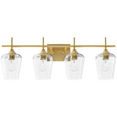 Vonluce 4-light vanity fixture with clear glass shades over mirror for modern bathrooms.