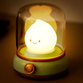 WANIDEA cute chibi flame lamp on bedside table provides warm, cozy ambience.