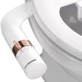 WaterLACE bidet attachment in rose gold with front view showing slim space-saving design