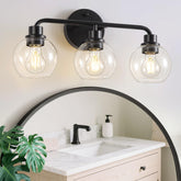 Watyo 3-light matte-black bathroom sconce illuminates vanity with modern style