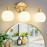 Watyo 3-light bathroom sconce with milk-glass shades diffuses light softly