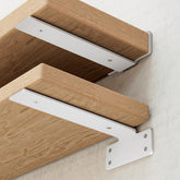 WEKIS 6in white shelf brackets with hidden design for clean, sturdy shelves.