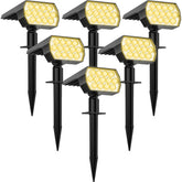 WELALO solar spot lights outdoor highlight a tree for curb appeal and nighttime security.