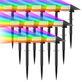 WENATY color-changing solar spot light brightening a garden at night