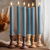 West Ivory 10-inch blue fluted LED candle with remote for safe, convenient ambience.