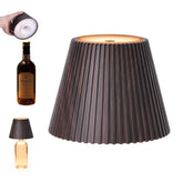 WILIT Wireless Bottle Lamp resting on a bottle for cozy desk lighting.