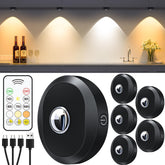 WILLED puck lights mounted under cabinet provide bright, hands-free illumination.