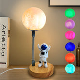 WLHONG Moon Lamp for kids with astronaut design, soft 3D moon glow for bedtime.